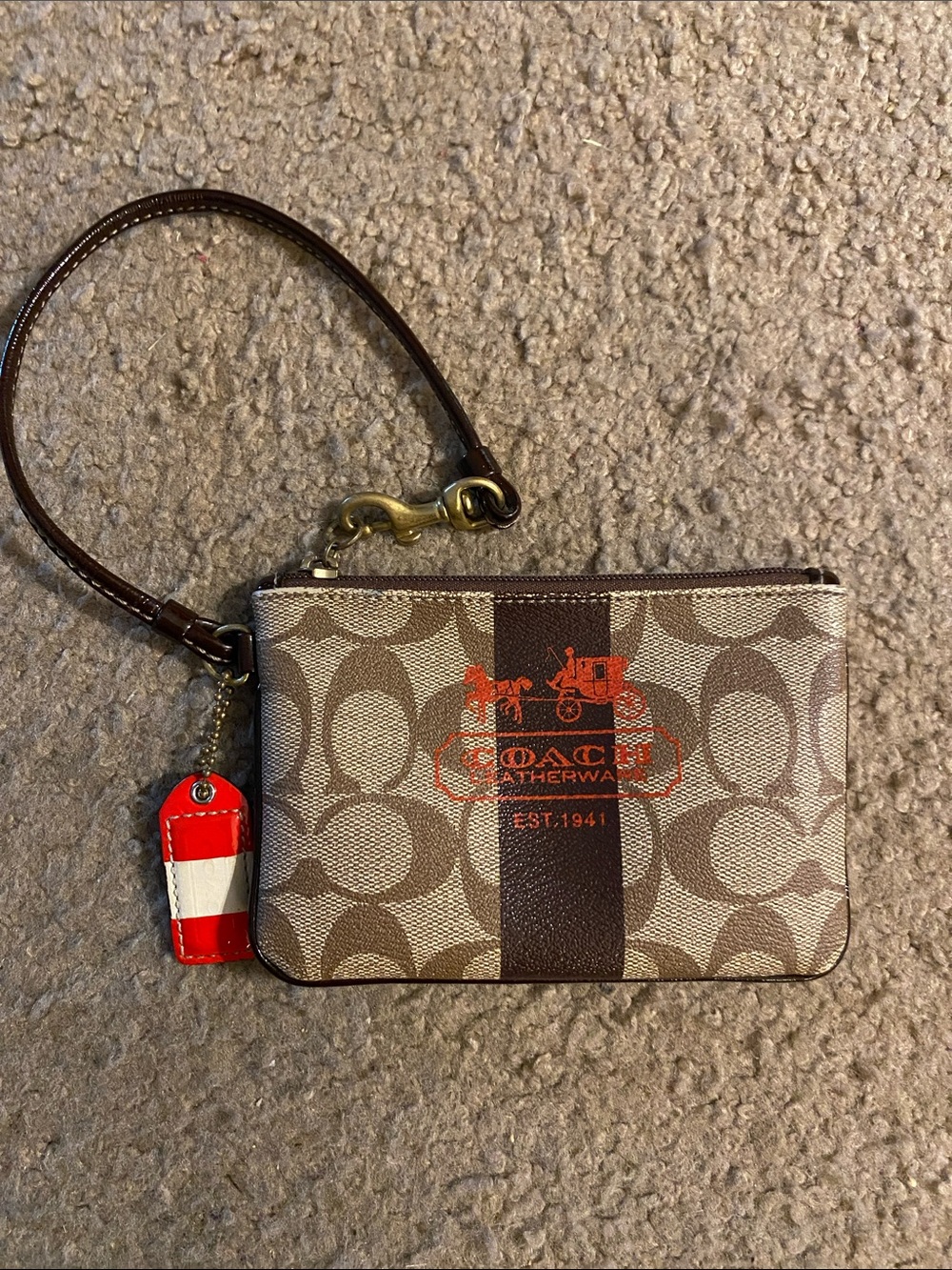 Coach Tattersall Brown Signature Canvas Wristlet with Orange Logo and Red Tag